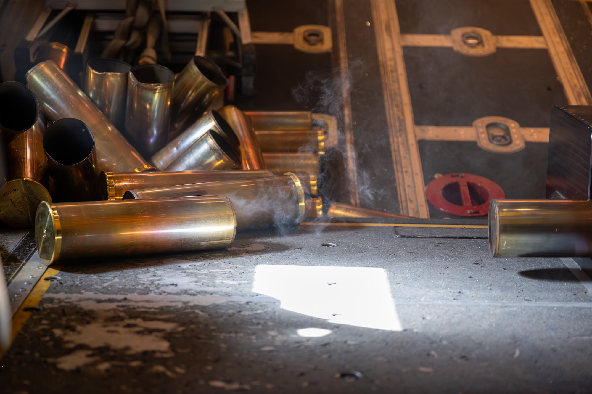 A 105mm howitzer shell casing on the floor of an AC-130J