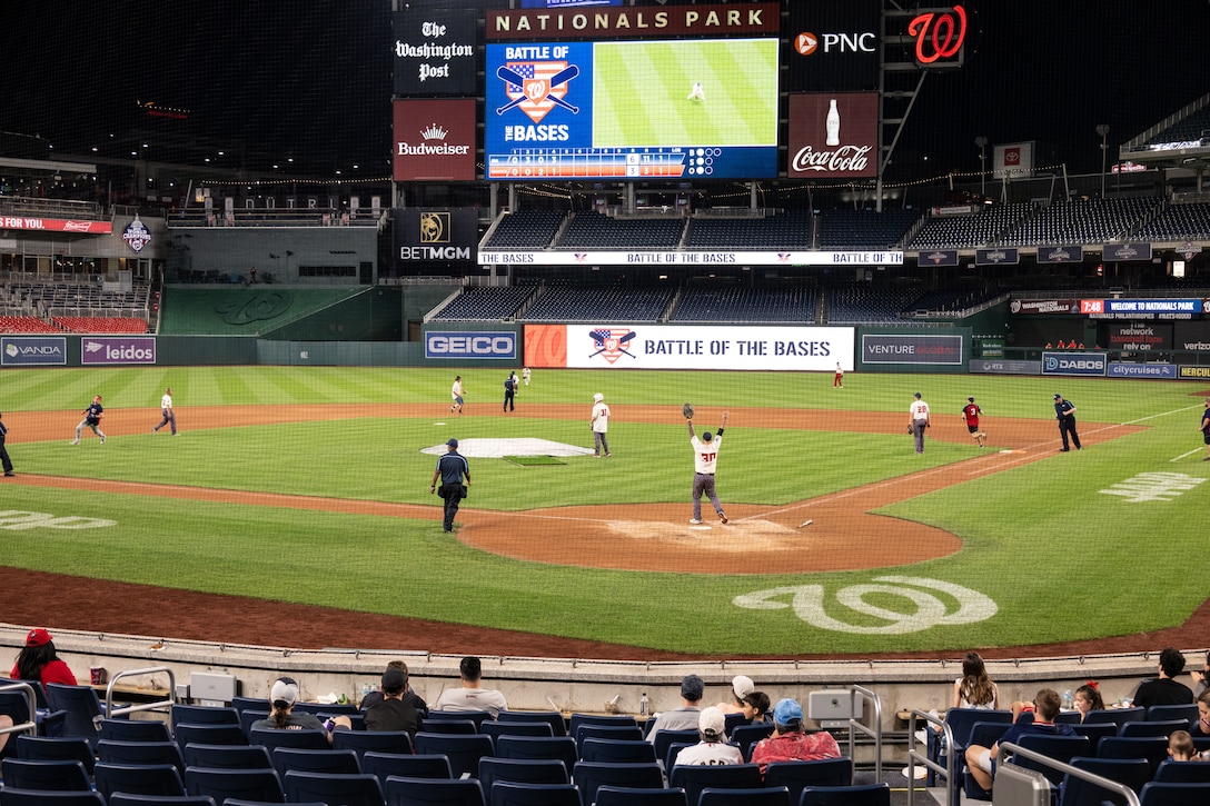 The Joint Base Andrews softball team plays against Marine Corps Base Quantico during the championship game of Battle of the Bases at Nationals Park, Washington, D.C., Sept. 13, 2025.