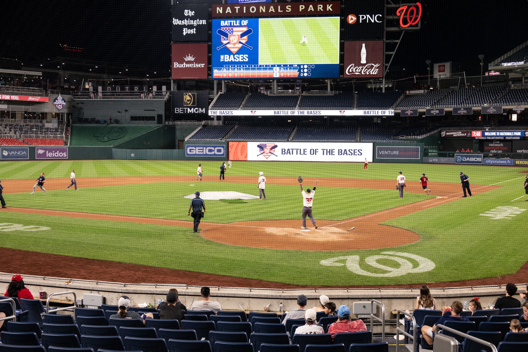 The Joint Base Andrews softball team plays against Marine Corps Base Quantico during the championship game of Battle of the Bases at Nationals Park, Washington, D.C., Sept. 13, 2025.