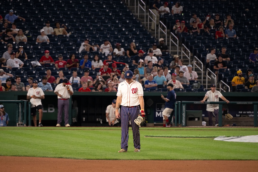 The Joint Base Andrews softball team plays against Marine Corps Base Quantico during the championship game of Battle of the Bases at Nationals Park, Washington, D.C., Sept. 13, 2025.