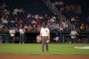 The Joint Base Andrews softball team plays against Marine Corps Base Quantico during the championship game of Battle of the Bases at Nationals Park, Washington, D.C., Sept. 13, 2025.
