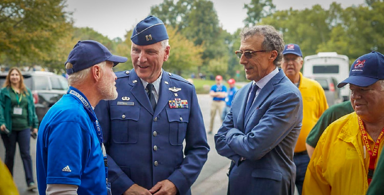 Retired U.S. Air Force Capt. Earl Morse and Jeff Miller, co-founders of Honor Flight, speak with veterans during a visit to Washington, D.C., to attend an awards ceremony. Honor Flight brings veterans to the nation’s capital to visit memorials built in their honor. (Courtesy photo from Morse)