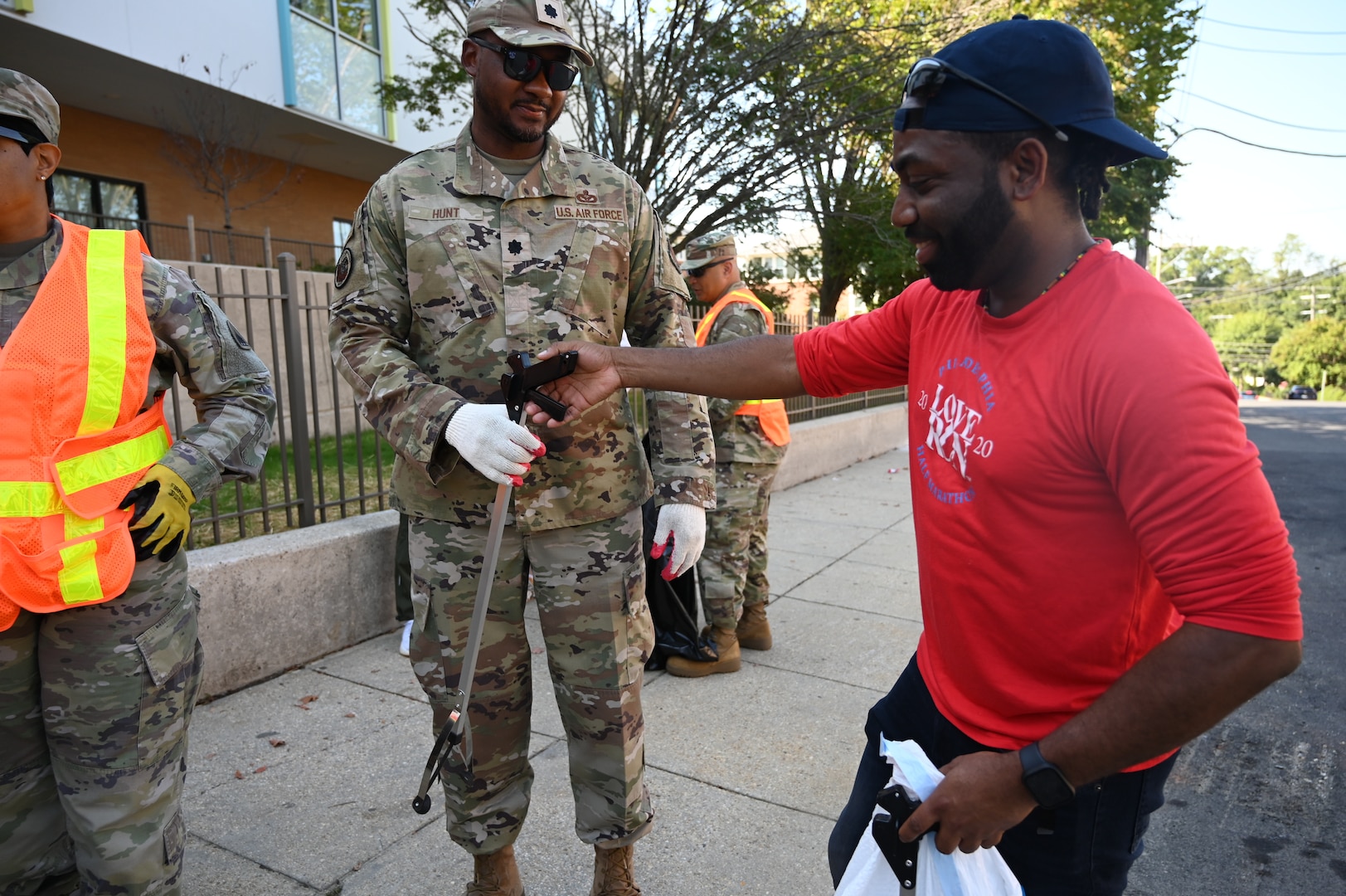 Brig. Gen. Leland D. Blanchard II, Commanding General (Interim) of the D.C. National Guard, and members of Task Force Beautification join Ward 8 residents, volunteers, and 8B06 Advisory Neighborhood Commission (ANC) members for a pop-up community clean-up in Washington, D.C., Sept. 13, 2025. The effort, led by ANC Commissioner Marcus “Mick” Hickman, marked the first time D.C. National Guard members worked alongside residents and elected officials in support of the D.C. Safe and Beautiful mission in providing critical support to the D.C. Metropolitan Police Department in ensuring the safety of all who live, work and visit the District. Many of the participating Guard members live and work in the District, strengthening their shared commitment to keeping local neighborhoods safe and clean.
