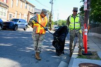 Brig. Gen. Leland D. Blanchard II, Commanding General (Interim) of the D.C. National Guard, and members of Task Force Beautification join Ward 8 residents, volunteers, and 8B06 Advisory Neighborhood Commission (ANC) members for a pop-up community clean-up in Washington, D.C., Sept. 13, 2025. The effort, led by ANC Commissioner Marcus “Mick” Hickman, marked the first time D.C. National Guard members worked alongside residents and elected officials in support of the D.C. Safe and Beautiful mission in providing critical support to the D.C. Metropolitan Police Department in ensuring the safety of all who live, work and visit the District. Many of the participating Guard members live and work in the District, strengthening their shared commitment to keeping local neighborhoods safe and clean.