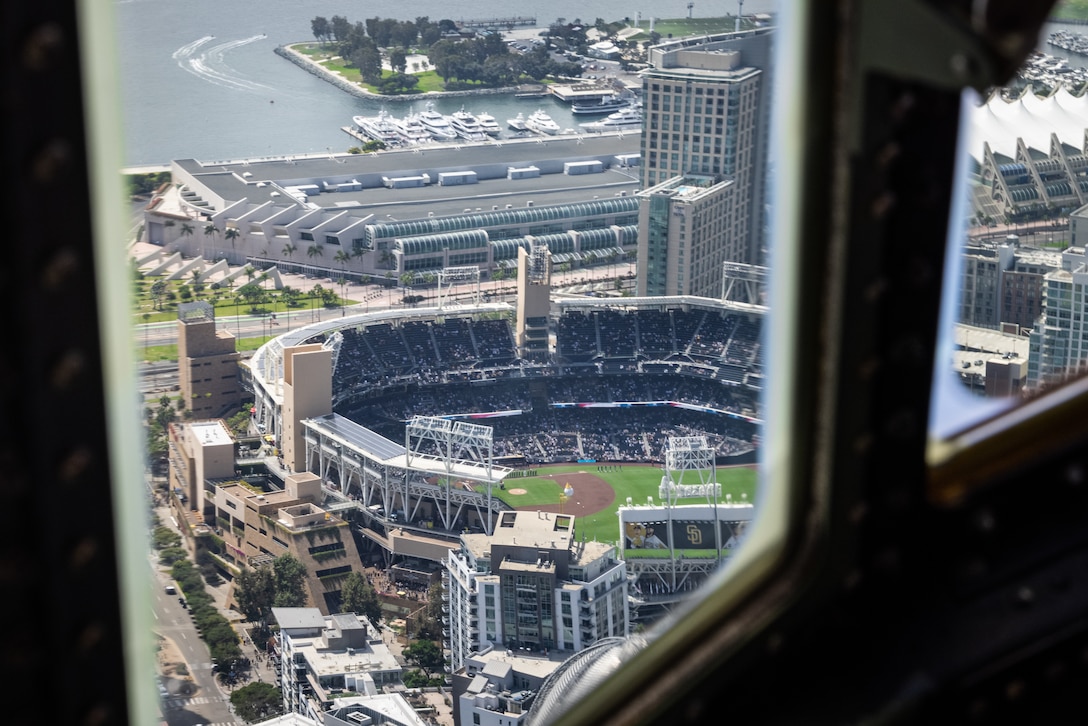 A U.S. Marine Corps KC-130J Super Hercules assigned to Marine Aerial Refueler Transport Squadron (VMGR) 352, Marine Aircraft Group 11, 3rd Marine Aircraft Wing, flies over Petco Park for a San Diego Padres military appreciation pre-game ceremony in San Diego, Sept. 14, 2025.
