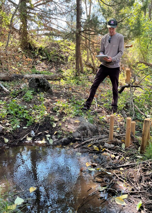 Cabel Patterson, environmental resource specialist with the Idaho Falls Regulatory Division Field Office, Walla Walla District, U.S. Army Corps of Engineers, conducts a compliance inspection during a site visit of a completed Beaver Dam Analog (BDA) restoration project at Spring Creek, a direct tributary of the South Fork Snake River, in Bonneville County, Sept. 3. The District’s Regulatory program covers the entire state, operating field offices in Boise, Coeur d’Alene, and Idaho Falls, along with support from headquarters in Walla Walla, Washington. Each year, specialists review about 2,000 permit-related actions, issue or verify more than 600 permits, and complete around 350 jurisdictional determinations. (U.S. Army photo courtesy of Brendan Jones)