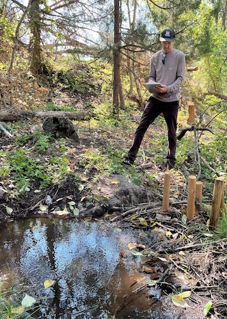 Cabel Patterson, environmental resource specialist with the Idaho Falls Regulatory Division Field Office, Walla Walla District, U.S. Army Corps of Engineers, conducts a compliance inspection during a site visit of a completed Beaver Dam Analog (BDA) restoration project at Spring Creek, a direct tributary of the South Fork Snake River, in Bonneville County, Sept. 3. The District’s Regulatory program covers the entire state, operating field offices in Boise, Coeur d’Alene, and Idaho Falls, along with support from headquarters in Walla Walla, Washington. Each year, specialists review about 2,000 permit-related actions, issue or verify more than 600 permits, and complete around 350 jurisdictional determinations. (U.S. Army photo courtesy of Brendan Jones)