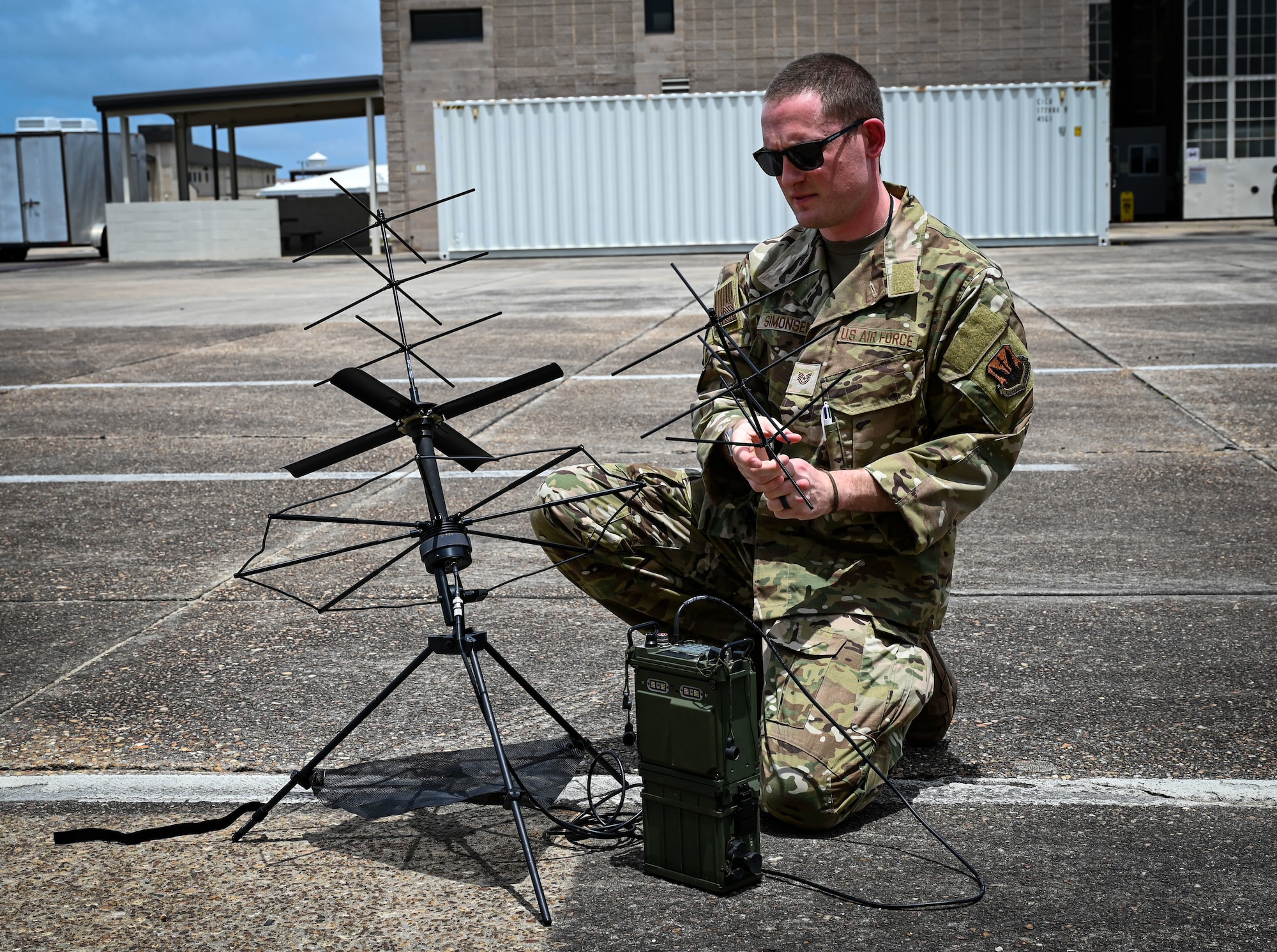 Simonsen, a client systems administrator, tackled the challenge of integrating the Mobile User Objective System (MUOS) and the AN/PRC-117G radio, a device he calls the “big green brick.” This system provides beyond-line-of-sight communication, enabling clear contact with aircraft regardless of their location around the globe.