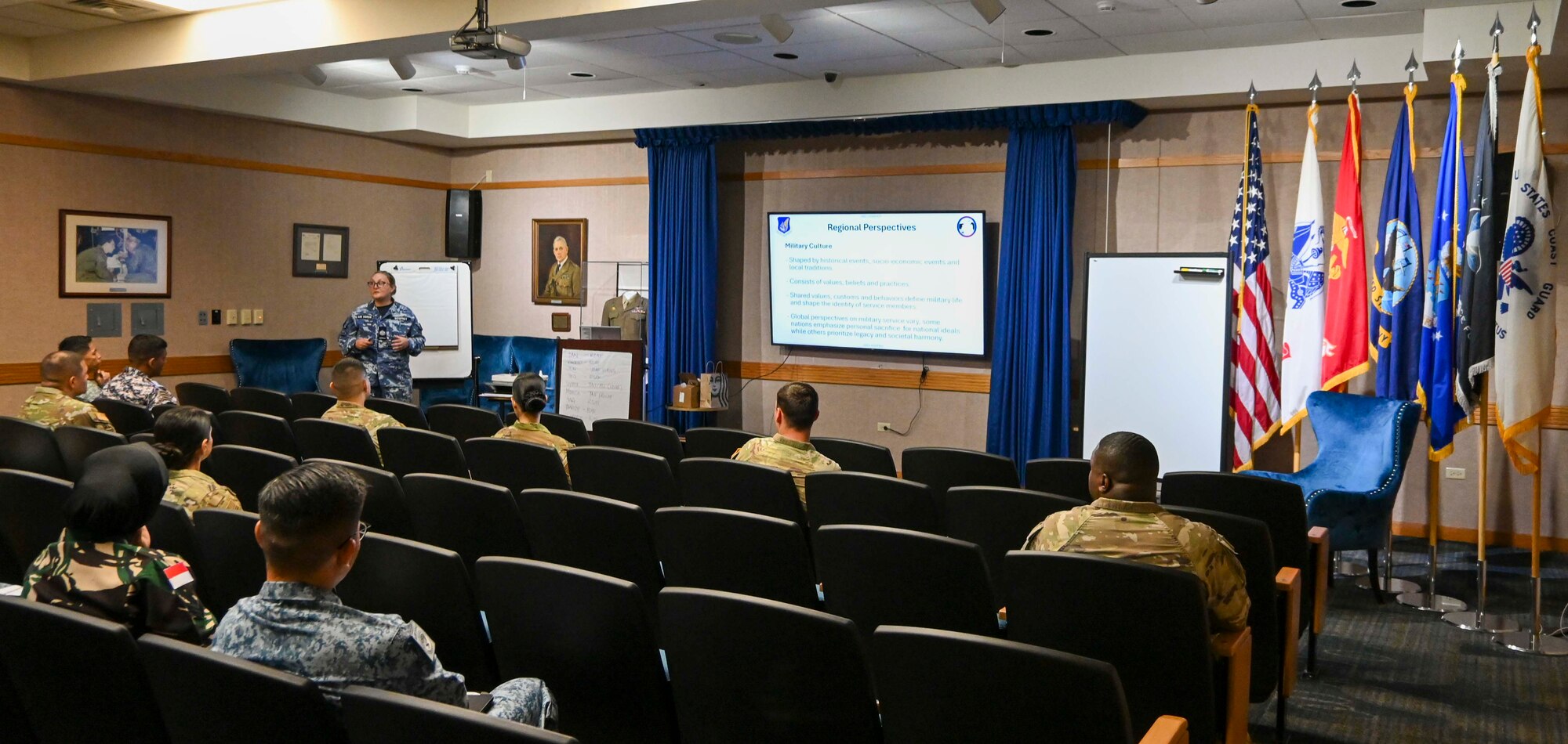 Royal Australian Air Force Warrant Officer Anita Godfrey, Pacific Air Forces Inter-Pacific Air Forces Academy commandant, instructs a lesson during the Inter-Pacific Junior Enlisted Leader Forum at Joint Base Pearl Harbor-Hickam, July 14, 2025. The academy develops enlisted leaders from allied and partner air forces to improve interoperability and communication. (Courtesy photo)