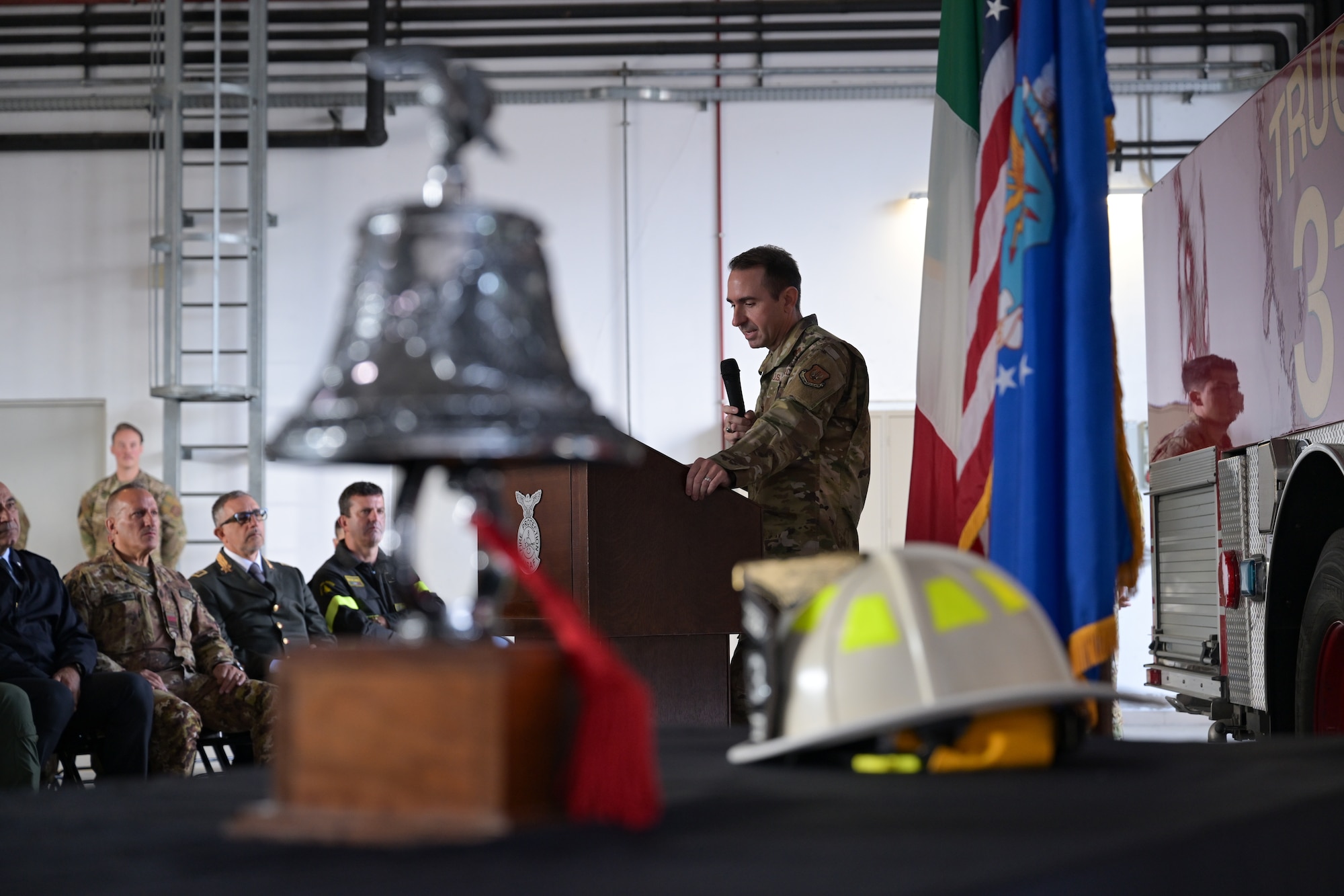 U.S. Air Force Col. Matthew Borawski, 31st Mission Support Group commander, speaks during the 9/11 Ceremony held at the 31st Civil Engineer Squadron fire department at Aviano Air Base, Italy, Sept. 11, 2025.