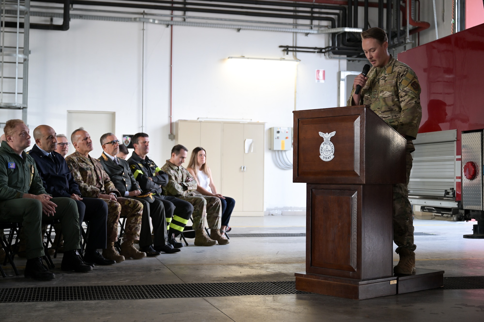 U.S. Air Force Senior Airman Christopher Byrd, 31st Civil Engineer Squadron explosive ordnance disposal technician, recite the EOD creed during the 9/11 Ceremony held at the 31st CES fire department at Aviano Air Base, Italy, Sept. 11, 2025.