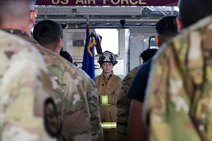 U.S. Air Force Senior Airman Emily Moran, 31st Civil Engineer Squadron firefighter, posts during the presentation of the colors at the 9/11 Ceremony held at the 31st CES fire department at Aviano Air Base, Italy, Sept. 11, 2025.