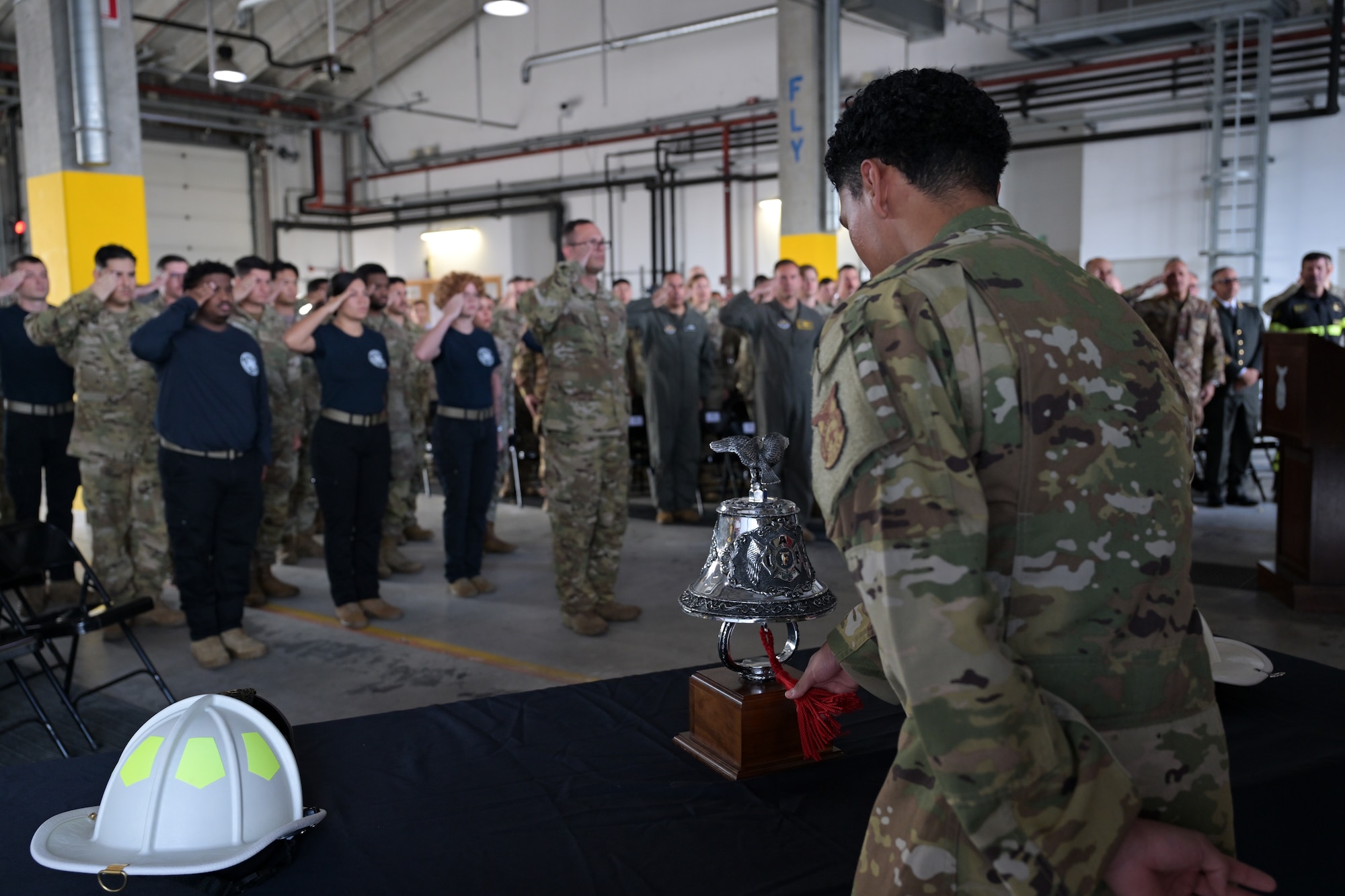 U.S. Air Force Senior Airman Aaron Garcia, 31st Civil Engineer Squadron firefighter, sounds the "Last Alarm" during the 9/11 Ceremony held at the 31 CES fire department at Aviano Air Base, Italy, Sept. 11, 2025.