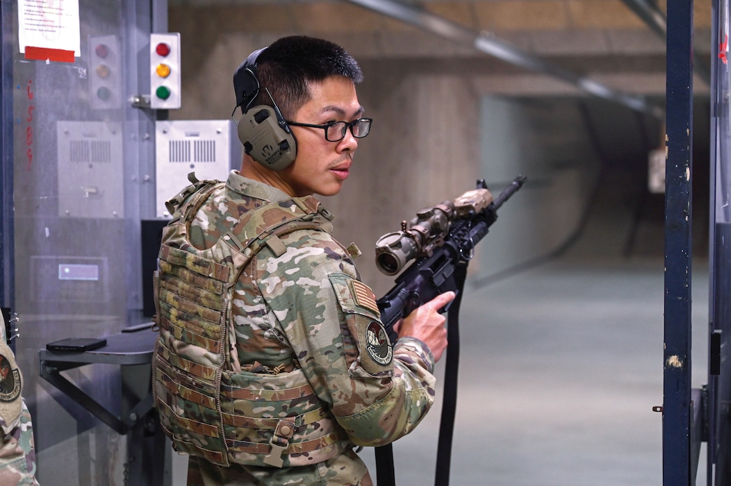 U.S. Air Force Senior Airman Jackie Hwang, 445th Security Forces Squadron fire team member, undergoes small arms training during unit training assembly at Wright-Patterson Air Force Base, Ohio, Aug. 3, 2025. The combat arms training helps security forces Airmen maintain readiness, and the combat arms training helps security forces Airmen maintain readiness (Photo by Tech. Sgt. Joel McCullough)