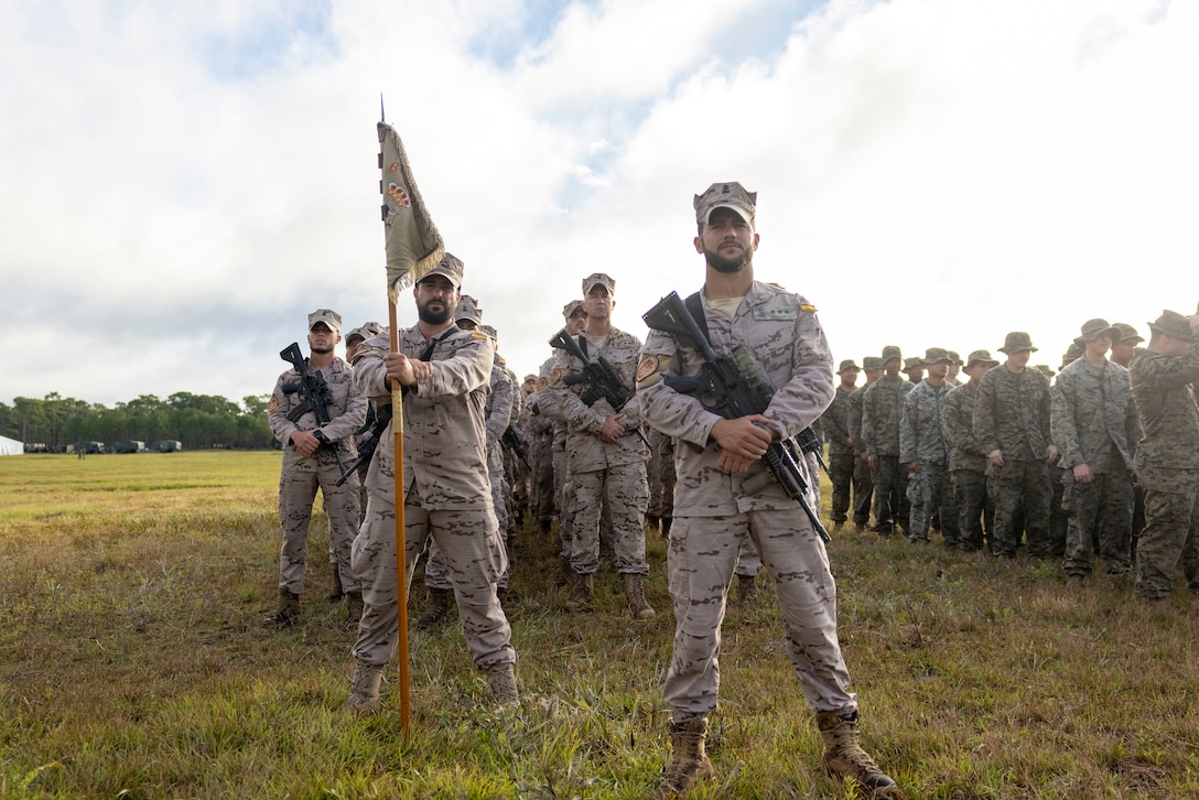 Marines with Infantería de Marina (Spanish marine corps) arrive at the opening ceremony of exercise UNITAS 2025, Marine Corps Base Camp Lejeune, North Carolina, Sep. 16, 2025. UNITAS, which is Latin for “unity,” was conceived in 1959 and has taken place annually since first conducted in 1960. This year marks the 66th iteration of the world’s longest running annual multinational maritime exercise. (U.S. Marine Corps photo by Lance Cpl. Payton Goodrich)