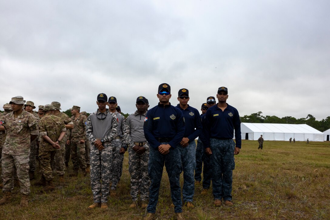 Marines with Batallón de Infantería de Marina, Armada de la República Dominicana, (marine Infantry Battalion within the Dominican Navy), stand in formation at the opening ceremony of exercise UNITAS 2025, Marine Corps Base Camp Lejeune, North Carolina, Sep. 16, 2025. UNITAS, which is Latin for “unity,” was conceived in 1959 and has taken place annually since first conducted in 1960. This year marks the 66th iteration of the world’s longest running annual multinational maritime exercise. (U.S. Marine Corps photo by Lance Cpl. Payton Goodrich)