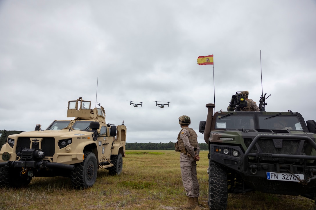 U.S. Marine Corps V-22 Ospreys, fly over the opening ceremony of exercise UNITAS 2025, Marine Corps Base Camp Lejeune, North Carolina, Sep. 16, 2025. UNITAS, which is Latin for “unity,” was conceived in 1959 and has taken place annually since first conducted in 1960. This year marks the 66th iteration of the world’s longest running annual multinational maritime exercise. (U.S. Marine Corps photo by Lance Cpl. Payton Goodrich)