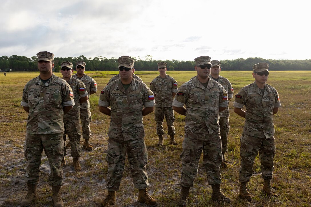 Marines with Cuerpo de Infantería de Marina (Chilean Marine Corps) stand in formation at the opening ceremony of exercise UNITAS 2025, Marine Corps Base Camp Lejeune, North Carolina, Sep. 16, 2025. UNITAS, which is Latin for “unity,” was conceived in 1959 and has taken place annually since first conducted in 1960. This year marks the 66th iteration of the world’s longest running annual multinational maritime exercise. (U.S. Marine Corps photo by Lance Cpl. Payton Goodrich)