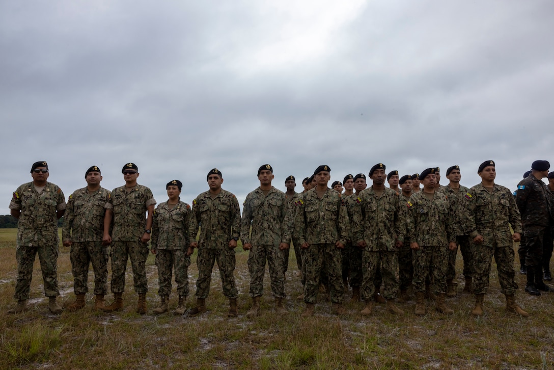 Marines with Cuerpo de Infantería de Marina (Ecuador naval infantry corps) stand in formation at the opening ceremony of exercise UNITAS 2025, Marine Corps Base Camp Lejeune, North Carolina, Sep. 16, 2025. UNITAS, which is Latin for “unity,” was conceived in 1959 and has taken place annually since first conducted in 1960. This year marks the 66th iteration of the world’s longest running annual multinational maritime exercise. (U.S. Marine Corps photo by Lance Cpl. Payton Goodrich)