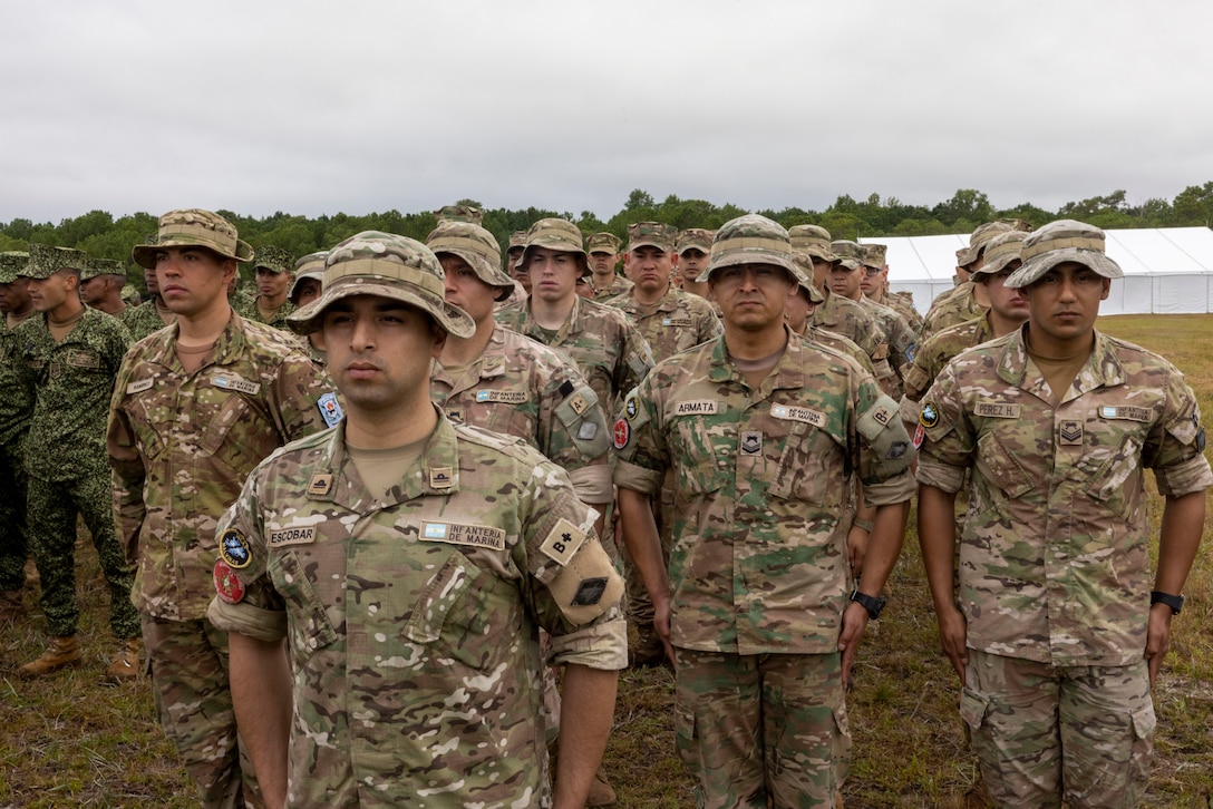 Marines with Infantería de Marina de la Armada de la República Argentina, (Naval Infantry of the Argentine Navy) stand in formation at the opening ceremony of exercise UNITAS 2025, Marine Corps Base Camp Lejeune, North Carolina, Sep. 16, 2025. UNITAS, which is Latin for “unity,” was conceived in 1959 and has taken place annually since first conducted in 1960. This year marks the 66th iteration of the world’s longest running annual multinational maritime exercise. (U.S. Marine Corps photo by Lance Cpl. Payton Goodrich)
