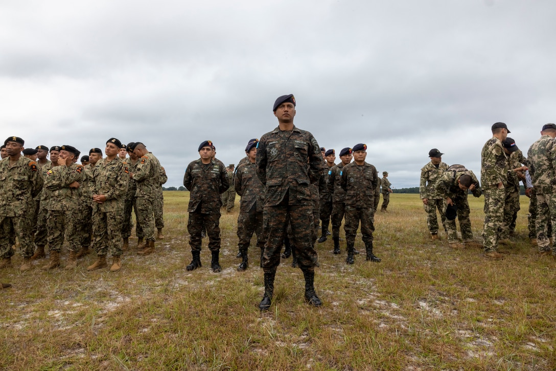 Marines with Brigada de Infantería de Marina (Guatemalan marine infantry brigade) stand in formation at the opening ceremony of exercise UNITAS 2025, Marine Corps Base Camp Lejeune, North Carolina, Sep. 16, 2025. UNITAS, which is Latin for “unity,” was conceived in 1959 and has taken place annually since first conducted in 1960. This year marks the 66th iteration of the world’s longest running annual multinational maritime exercise. (U.S. Marine Corps photo by Lance Cpl. Payton Goodrich)