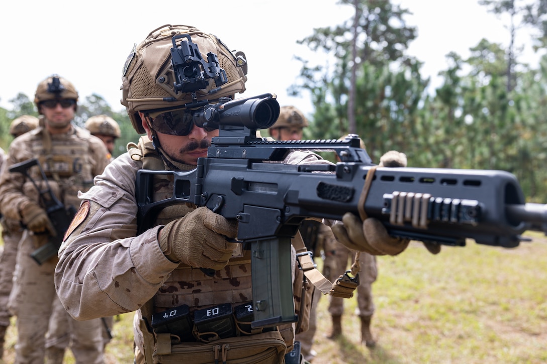 Marines with Infanteria de Marina (Spanish marine corps) practice weapons manipulation techniques during Exercise UNITAS 25 at Camp Lejeune, North Carolina, Sept. 15, 2025. UNITAS, which is Latin for “unity,” was conceived in 1959 and has taken place annually since first conducted in 1960. This year marks the 66th iteration of the world’s longest running annual multinational maritime exercise. The exercise trains forces in joint maritime operations that enhance tactical proficiency and increase interoperability with the presence of unmanned air, surface and submarine systems. (U.S. Marine Corps photo by Sgt. Eduardo Delatorre)