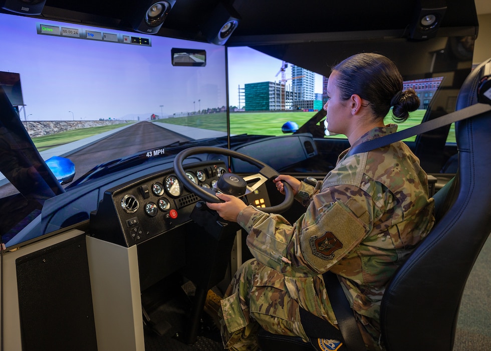 woman operates driving simulator