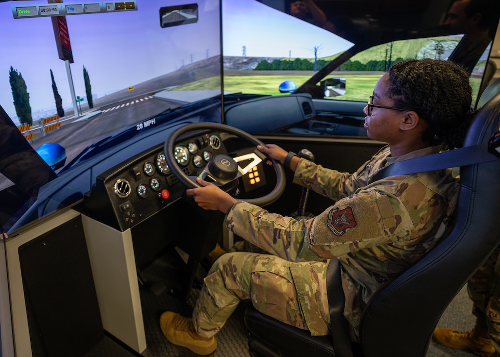 woman operates driving simulator