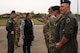 Rep. Ed Case is welcomed by 5th Bomb Wing leadership outside of the Weapons Storage Area at Minot Air Force Base, North Dakota, Sept. 13, 2025. The visit provided an opportunity for Minot AFB to showcase the strategic mission to the congressman.