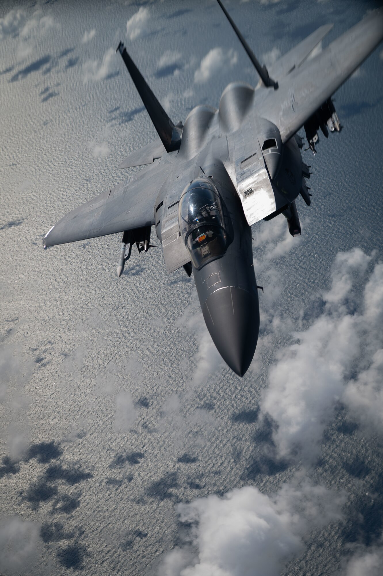 A U.S. Air Force F-15E Strike Eagle from the 48th Fighter Wing, RAF Lakenheath, flies away after receiving fuel from a KC-135 Stratotanker aircraft from the 100th Air Refueling Wing at RAF Mildenhall, during exercise Cobra Warrior, over the North Sea, Sept. 16, 2025.