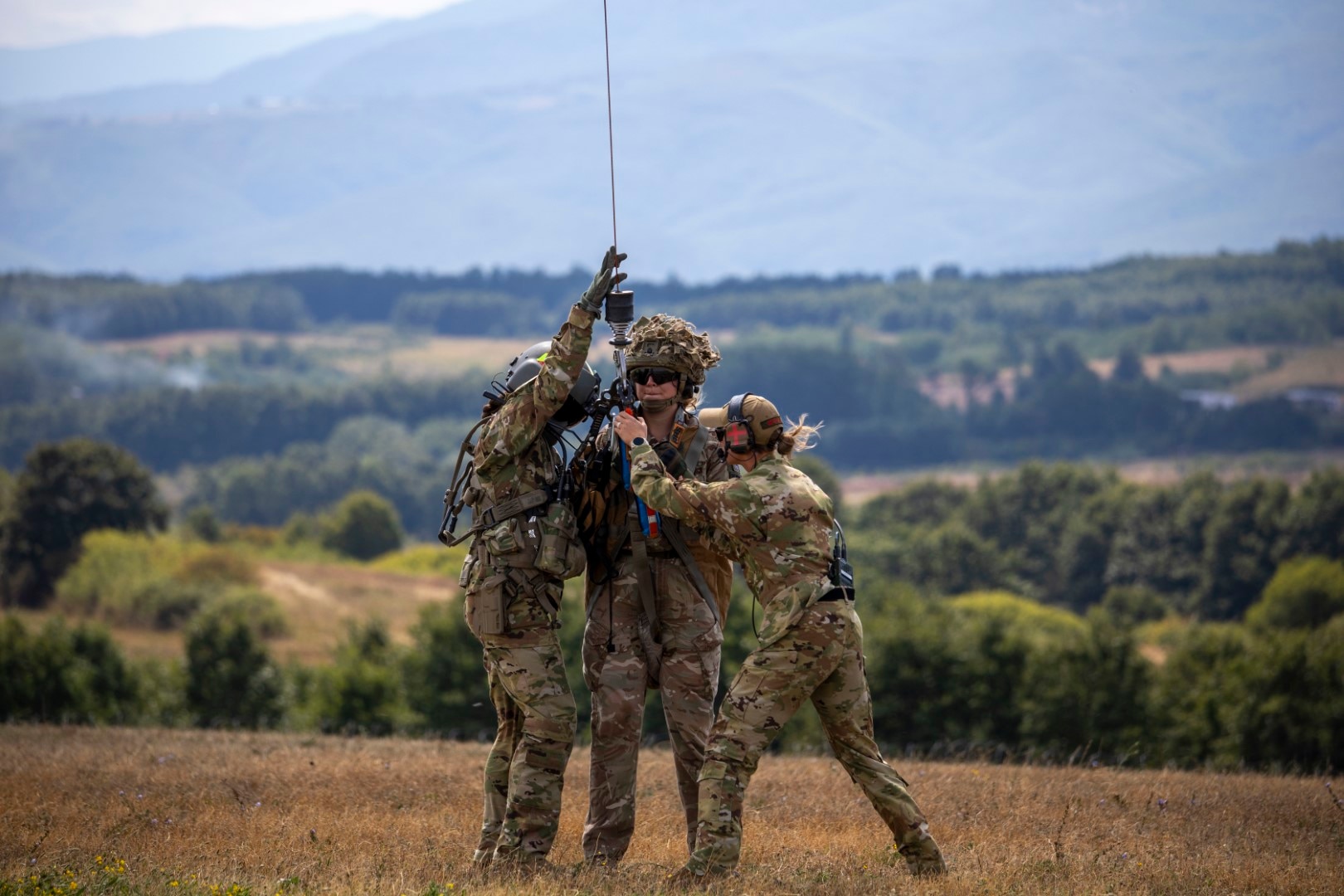 Kosovo Forces Regional Command-East’s (KFOR RC-E) 256th Infantry Brigade Combat Team Medical Evacuation (MEDEVAC) aircrew members trained alongside KFOR RC-E British forces in hot and cold load operations at Camp Bondsteel, Kosovo, Aug. 25, 2025.
