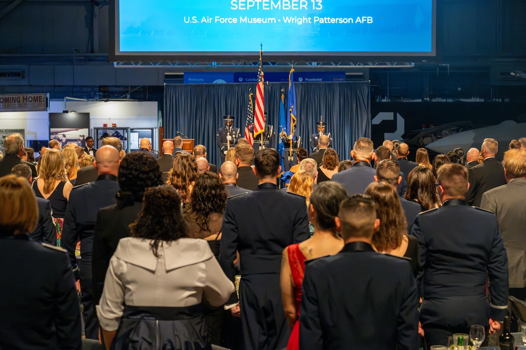 The Wright-Patterson Honor Guard presents the colors at the annual Wright-Patterson Air Force Ball, Sept. 13, 2025, at the National Museum of the United States Air Force. The Wright-Patt Honor Guard is the most tasked base in the Air Force, covering six states across 210,000 square miles and 203 counties. (U.S. Air Force photo by Jack Gardner)
