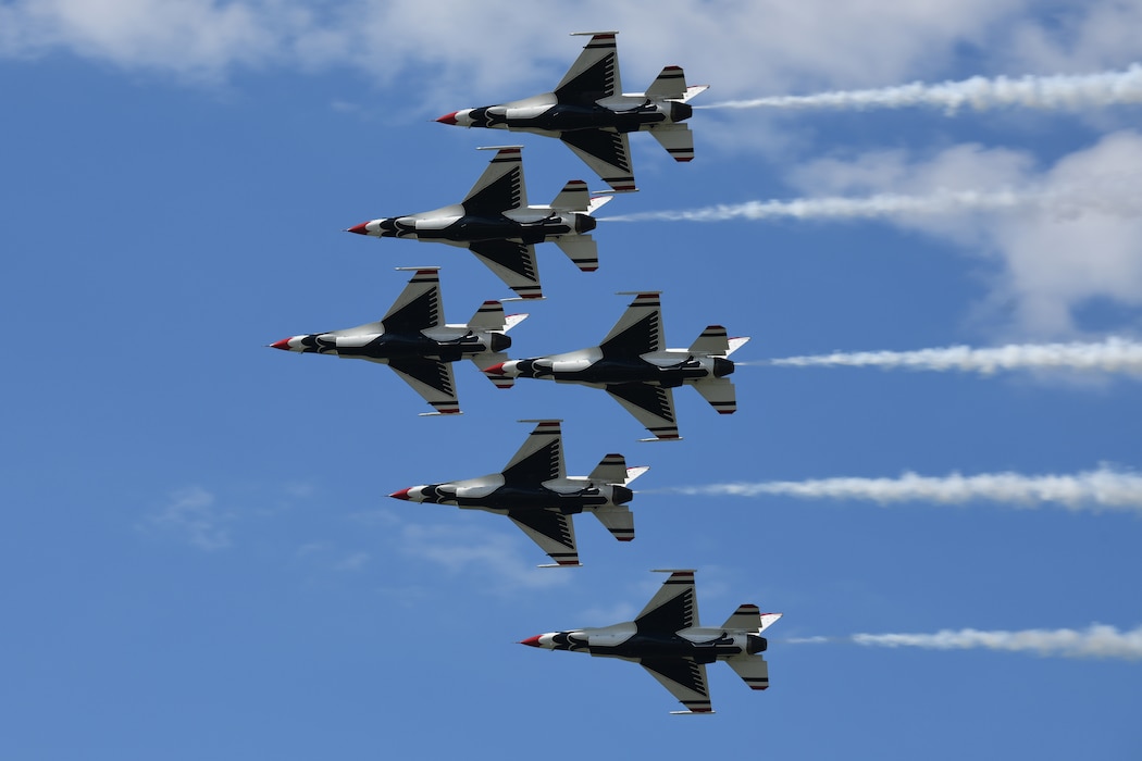 The U.S. Air Force Thunderbirds demonstration team performs a six-aircraft pass in their F-16 Fighting Falcon aircraft during the 2025 Cleveland National Air Show, held at Burke Lakefront Airport, Sept. 1, 2025.