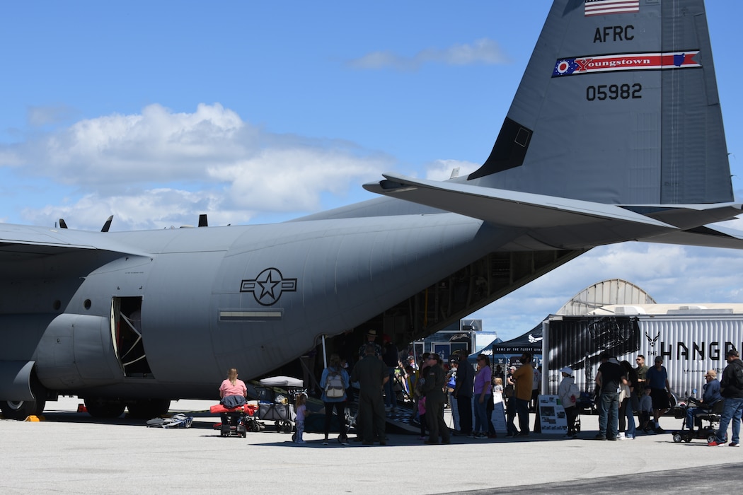 A line of guests wait to walk through the 910th Airlift Wing’s first C-130J-30 Super Hercules aircraft, based at nearby Youngstown Air Reserve Station, Ohio, which is featured as a static display during the 2025 Cleveland National Air Show, held at Burke Lakefront Airport, Aug. 30, 2025.