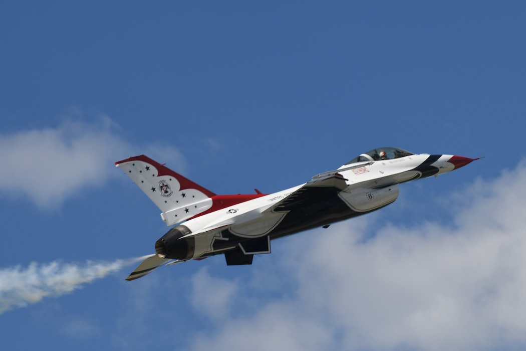Air Force Maj. Laney "Rogue" Schol, the opposing solo pilot with the U.S. Air Force Thunderbirds demonstration team, performs a slow pass in a F-16 Fighting Falcon aircraft during the 2025 Cleveland National Air Show, held at Burke Lakefront Airport, Sept. 1, 2025.