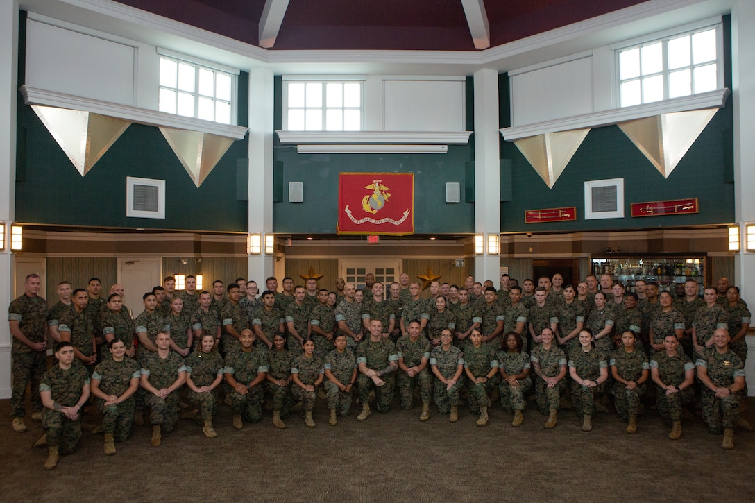 U.S. Marine Corps Sgt. Maj. Carlos A. Ruiz, 20th sergeant major of the marine corps, gathers with Marines and Sailors for a group photo to commemorate their time during the Operational Stress Control and Readiness (OSCAR) training event hosted by Manpower and Reserve Affairs, Marine and Family Programs Division at Marine Corps Base Quantico, Virginia, September 9-10, 2025.