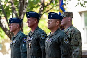 (Left to right) Lt. Gen. Scott Pleus, Director of Staff, Headquarters Air Force, presided over the Air Force Operational Test and Evaluation Center change of command for outgoing commander Maj. Gen. Michael Drowley and incoming commander Brig. Gen. Jesse Friedel.