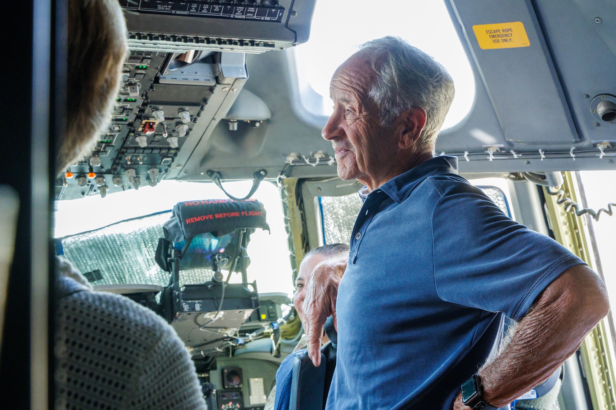 Vietnam War veteran and POW survivor, retired Capt. Paul Granger and his wife Leslie tour a C-17 assigned to the 418th Flight Test Squadron on Edwards Air Force Base, California, Sept. 12. During his tour of the aircraft, Granger shared his story of being a B-52 crew member and shot down and taken prisoner during the Vietnam War. (Air Force photo by James West)