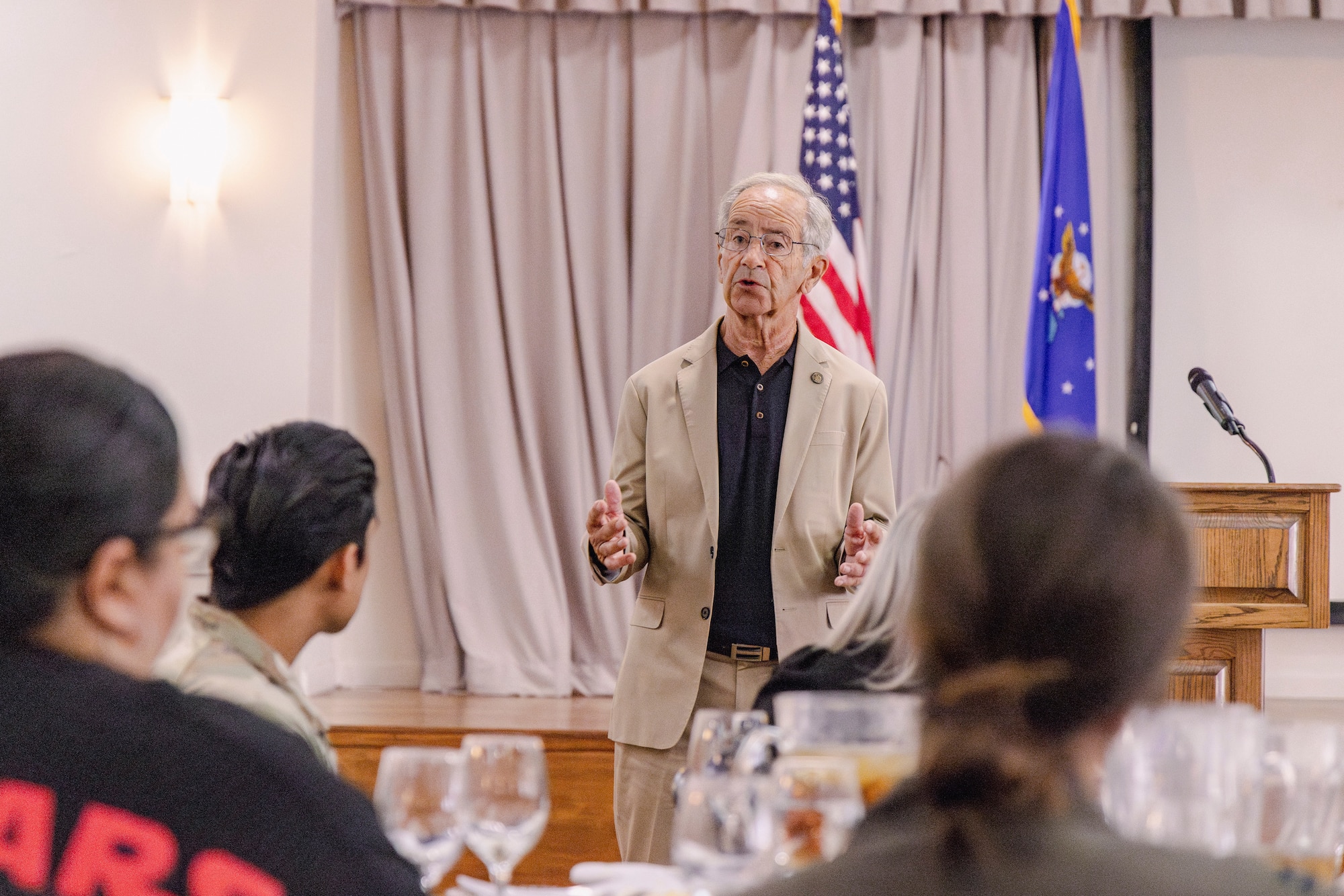 Vietnam War veteran and POW survivor, retired Capt. Paul Granger shares his story of surviving as prisoner of war during the POW/MIA luncheon on Edwards Air Force Base, California, Sept. 12.  (Air Force photo by Brandon Hernandez)