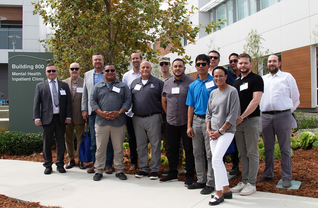 U.S. Amy Corps of Engineers Los Angeles District project managers, engineers and safety specialists, who managed the construction of the VA Long Beach Healthcare System's mental health in-patient and out-patient facilities, pose for a picture following a ribbon-cutting ceremony signifying the opening of the facilities Aug. 28 in Long Beach, California.