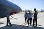 A U.S. Air Force pilot shows civilians an F-22 Raptor up close on Joint Base Pearl Harbor-Hickam, Hawaii.