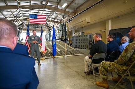 Lt. Col. Michael Medrano, 433rd Operations Group interim commander, addresses an audience during a redesignation ceremony at Joint Base San Antonio-Lackland, Texas, Sept. 6, 2025.