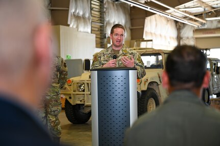 Major Alexander Williams, 433rd Contingency Response Squadron commander, addresses an audience during a redesignation ceremony at Joint Base San Antonio-Lackland, Texas, Sept. 6, 2025.