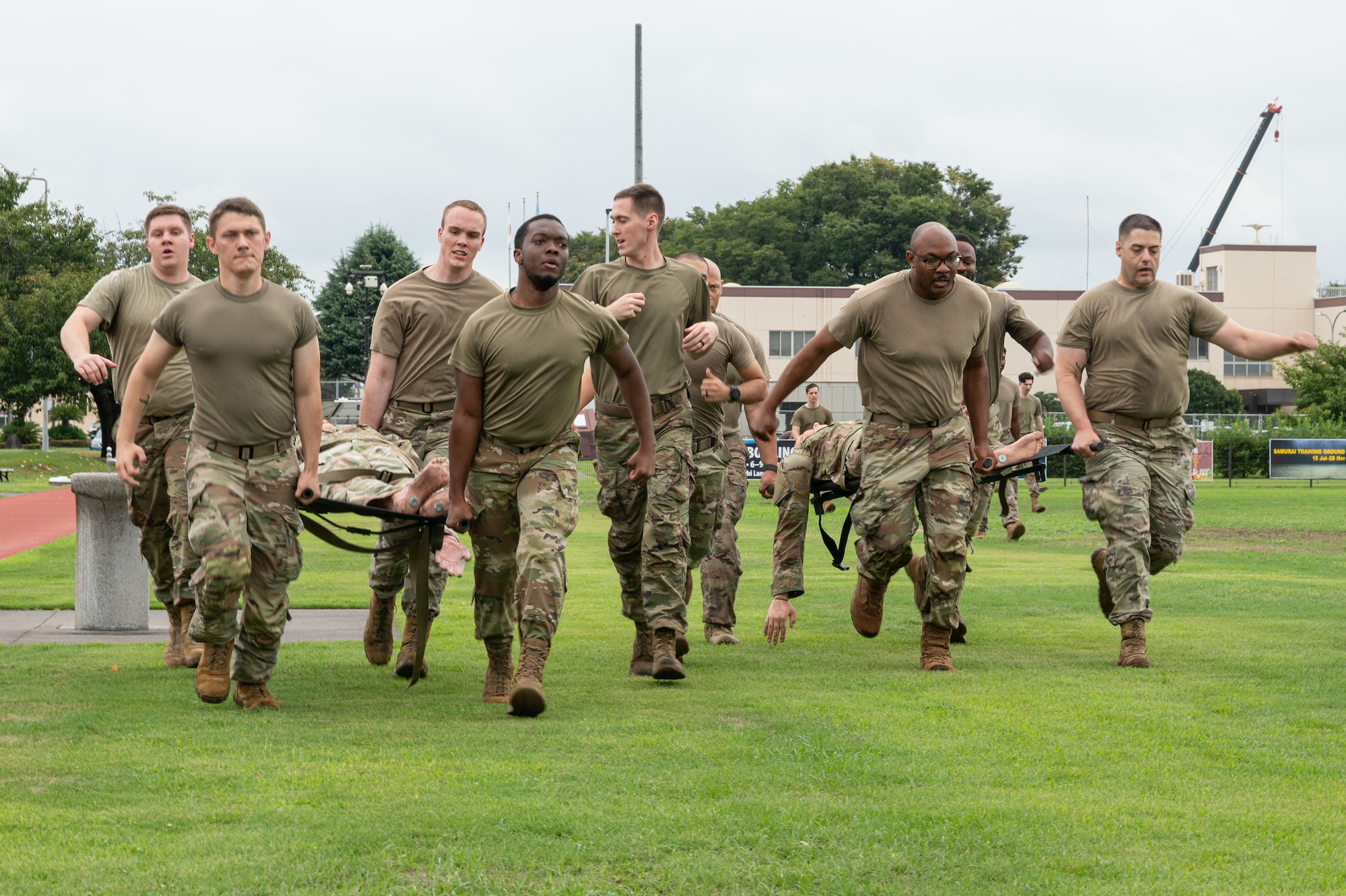 Servicemembers perform litter carries