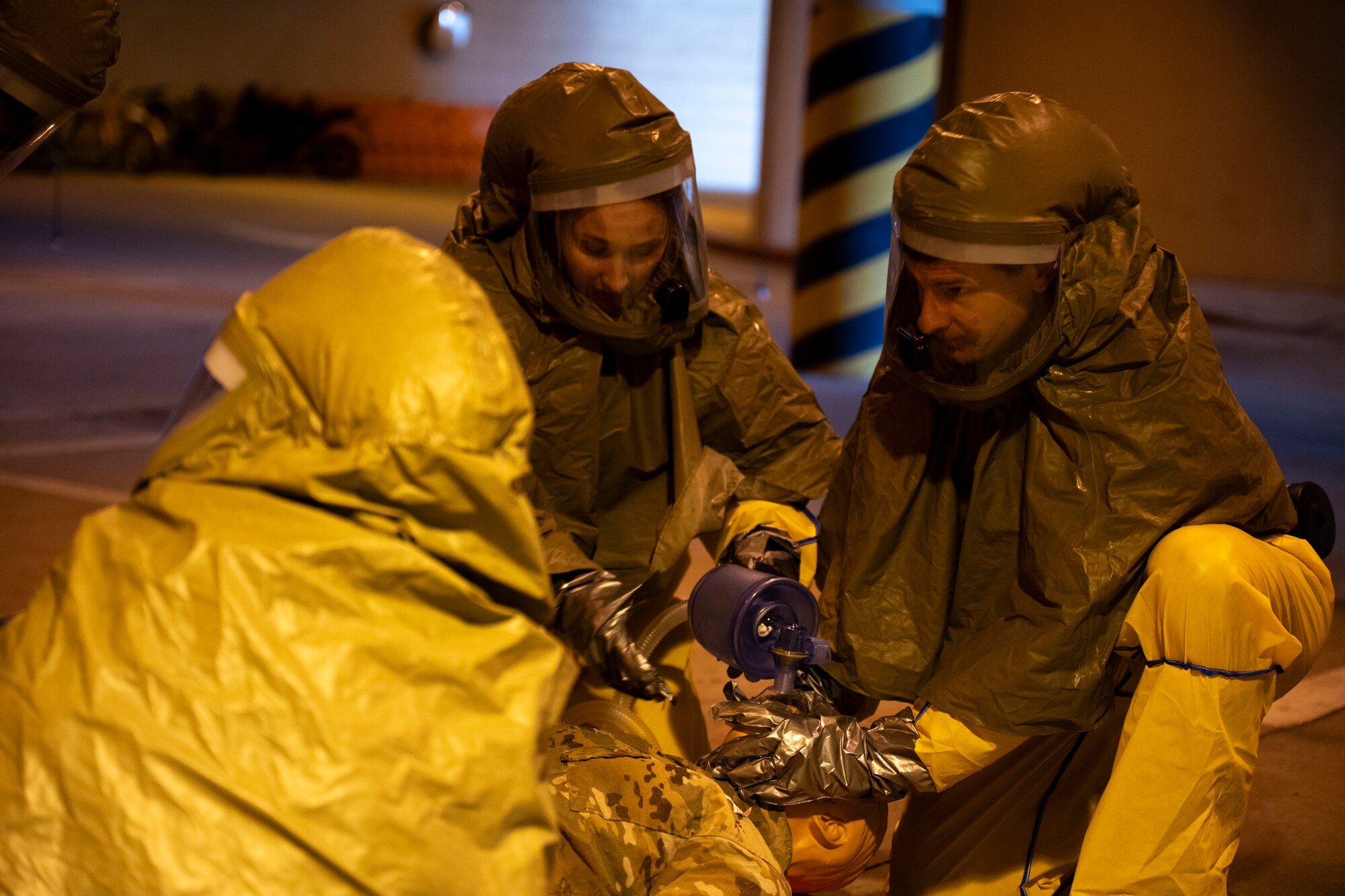U.S. Air Force U.S. Air Force Airmen assigned to the 51st Medical Group respond to the first simulated patient through the decontamination line at Osan Air Base, Republic of Korea, Sept. 11, 2025.