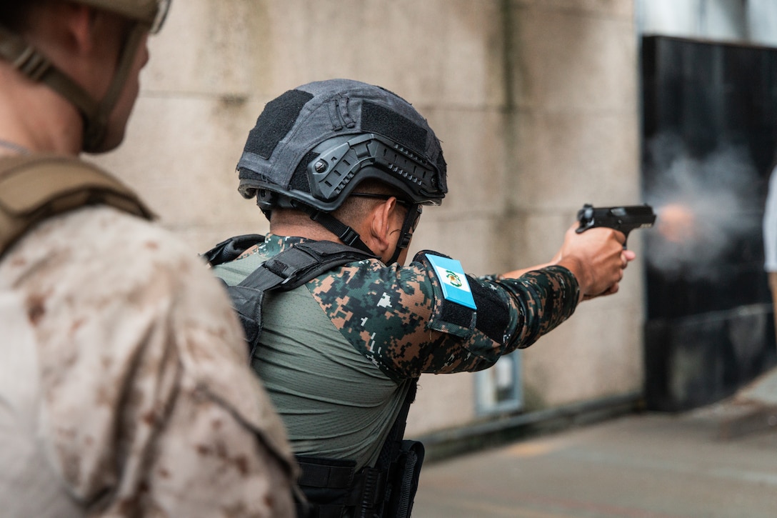 A marine with Brigada de Infanteria de Marina (Marine Infantry Brigade) of Guatemala engages targets with a Beretta M9 during a pistol range as part of UNITAS 2025 at Stone Bay, Marine Corps Base Camp Lejeune, North Carolina, Sept. 16, 2025. UNITAS, which is Latin for “unity,” was conceived in 1959 and has taken place annually since first conducted in 1960. This marks the 66th iteration of the world’s longest running annual multinational maritime exercise. (U.S. Marine Corps photo by Cpl. Osmar VasquezHernandez)