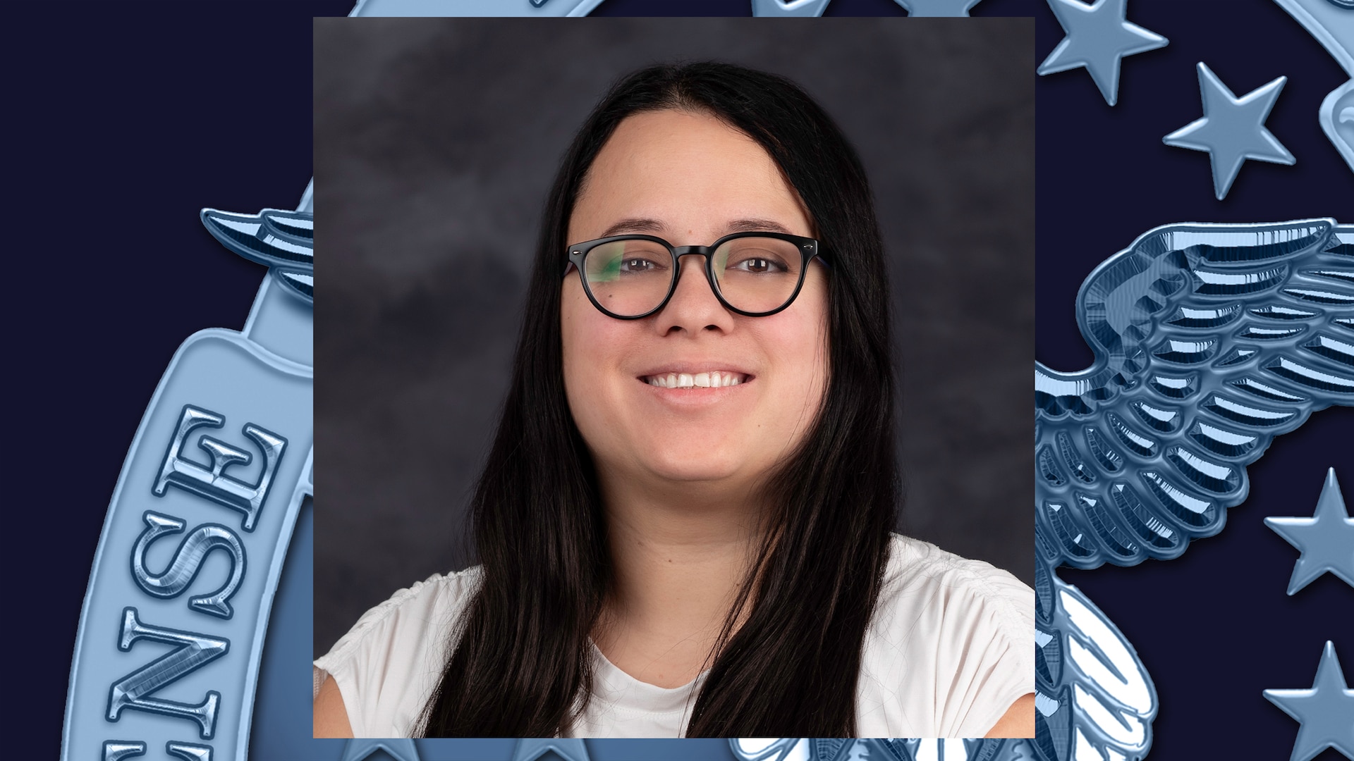 Headshot of woman with straight black hair wearing glasses and white shirt