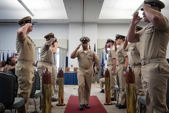 Chief Petty Officer Luis Ibarra, center, is “piped ashore” during a promotion ceremony held Tuesday, September 16, 2025 aboard Marine Corps Air Station Cherry Point.  Ibarra and six other Sailors promoted to the rank of Chief Petty Officer while two Marines earned the honorary title.



Promotion to “Chief” and earning the honorary title of Chief Petty Officer is a recognition of exceptional performance in their current duties and potential for continued success in the Navy and Marine Corps.