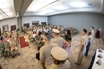 Chief Petty Officer Matthew Cutler and his family, center, pause for a photo during a ceremony held Tuesday, September 16, 2025 aboard Marine Corps Air Station Cherry Point.  Cutler and six other Sailors promoted to the rank of Chief Petty Officer while two Marines earned the honorary title.
Promotion to “Chief” and earning the honorary title of Chief Petty Officer is a recognition of exceptional performance in their current duties and potential for continued success in the Navy and Marine Corps.