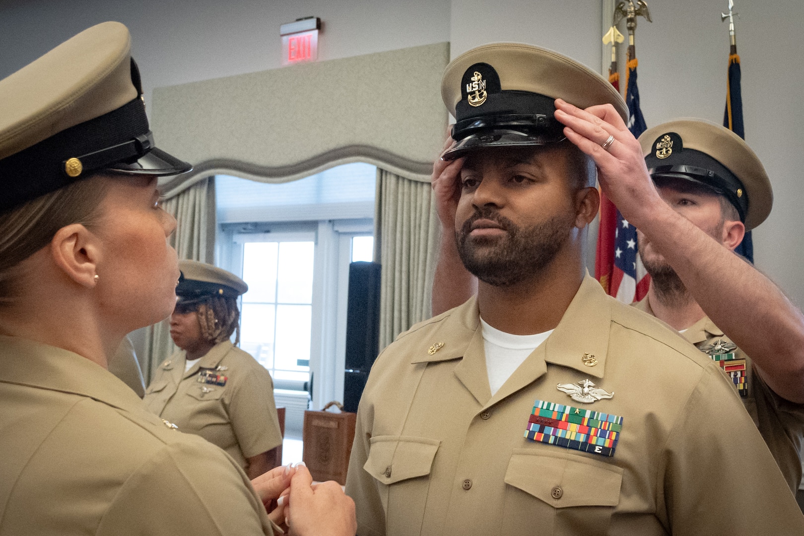 Chief Petty Officer Carmello Dixon, center, receives his Chief Petty Officer Cap during a ceremony held Tuesday, September 16, 2025 aboard Marine Corps Air Station Cherry Point.  Dixon and six other Sailors promoted to the rank of Chief Petty Officer while two Marines earned the honorary title.
Promotion to “Chief” and earning the honorary title of Chief Petty Officer is a recognition of exceptional performance in their current duties and potential for continued success in the Navy and Marine Corps.